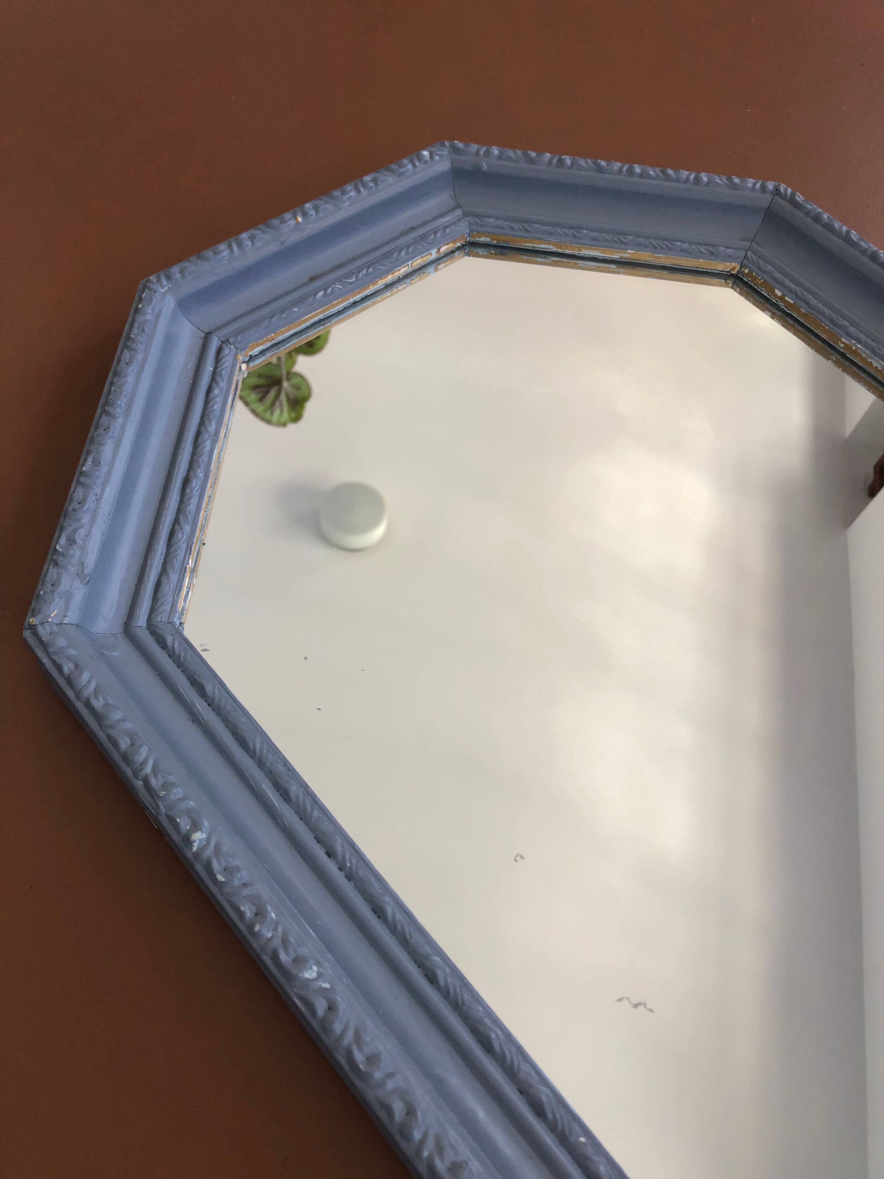 Old patinated mirror golden gray