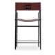 By contemporary classic bar stool with cognac leather backrest, black rubber, metal.