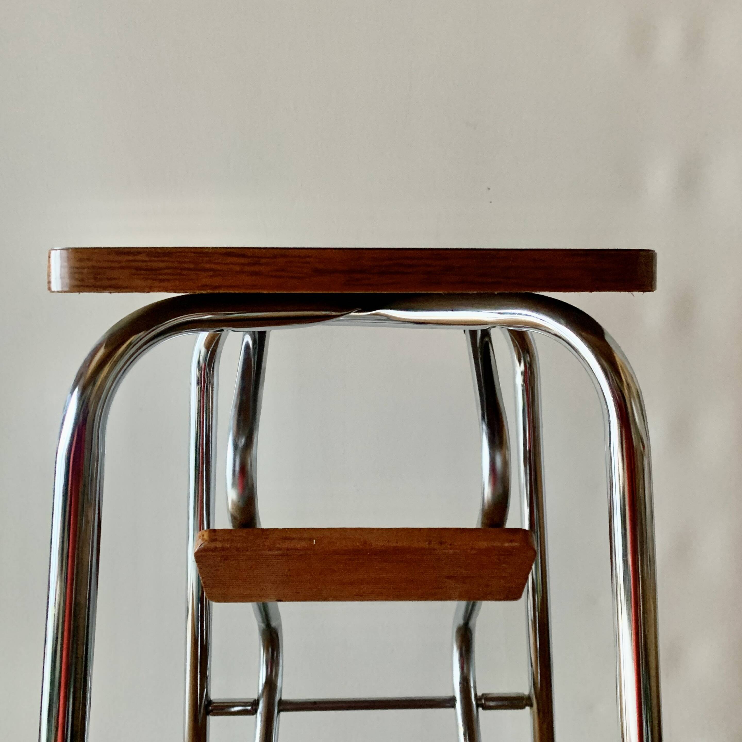 Vintage step stool in brown formica and chrome steel