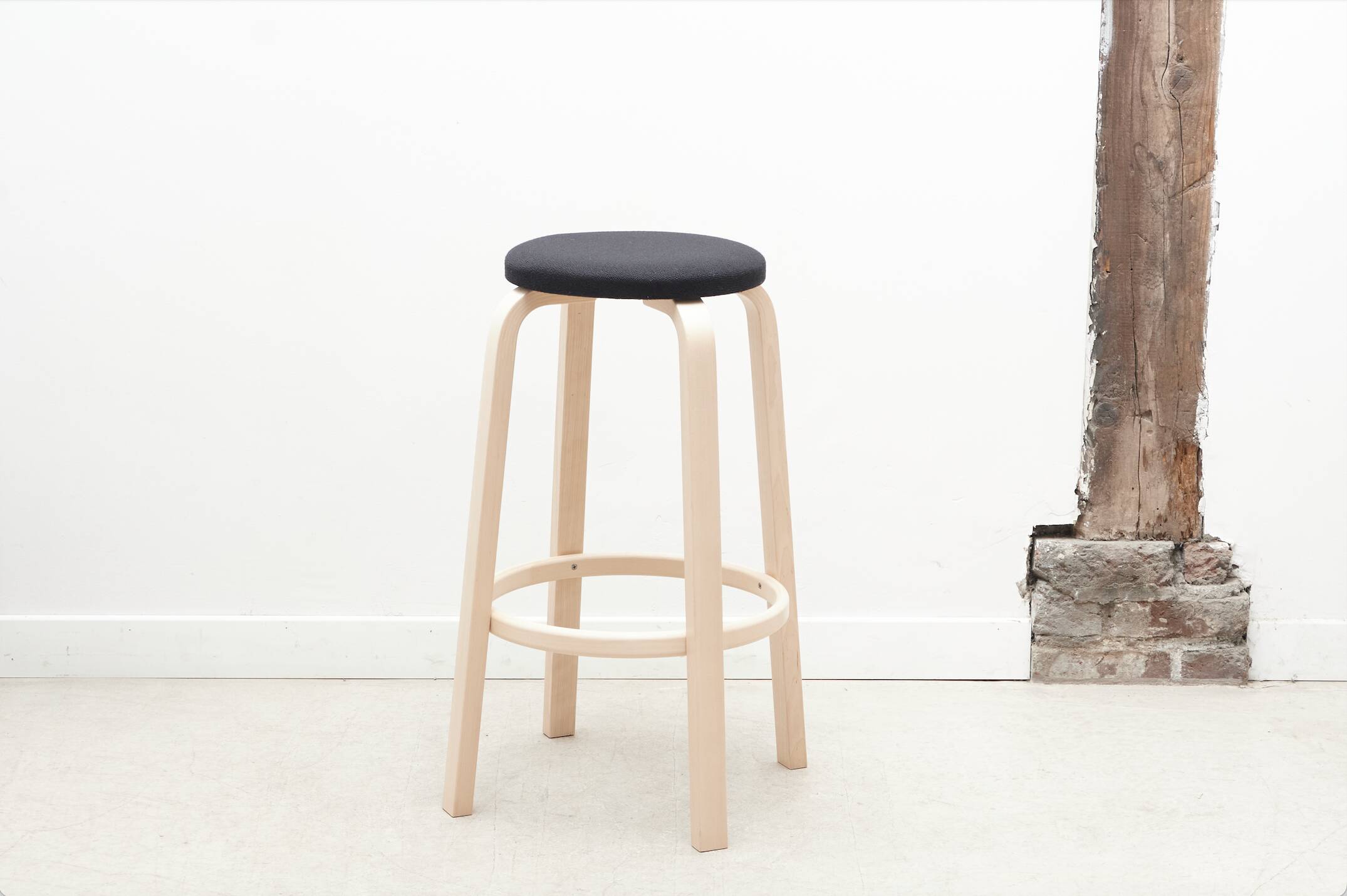 Alvar Aalto 64 stool in black and birch for Artek
