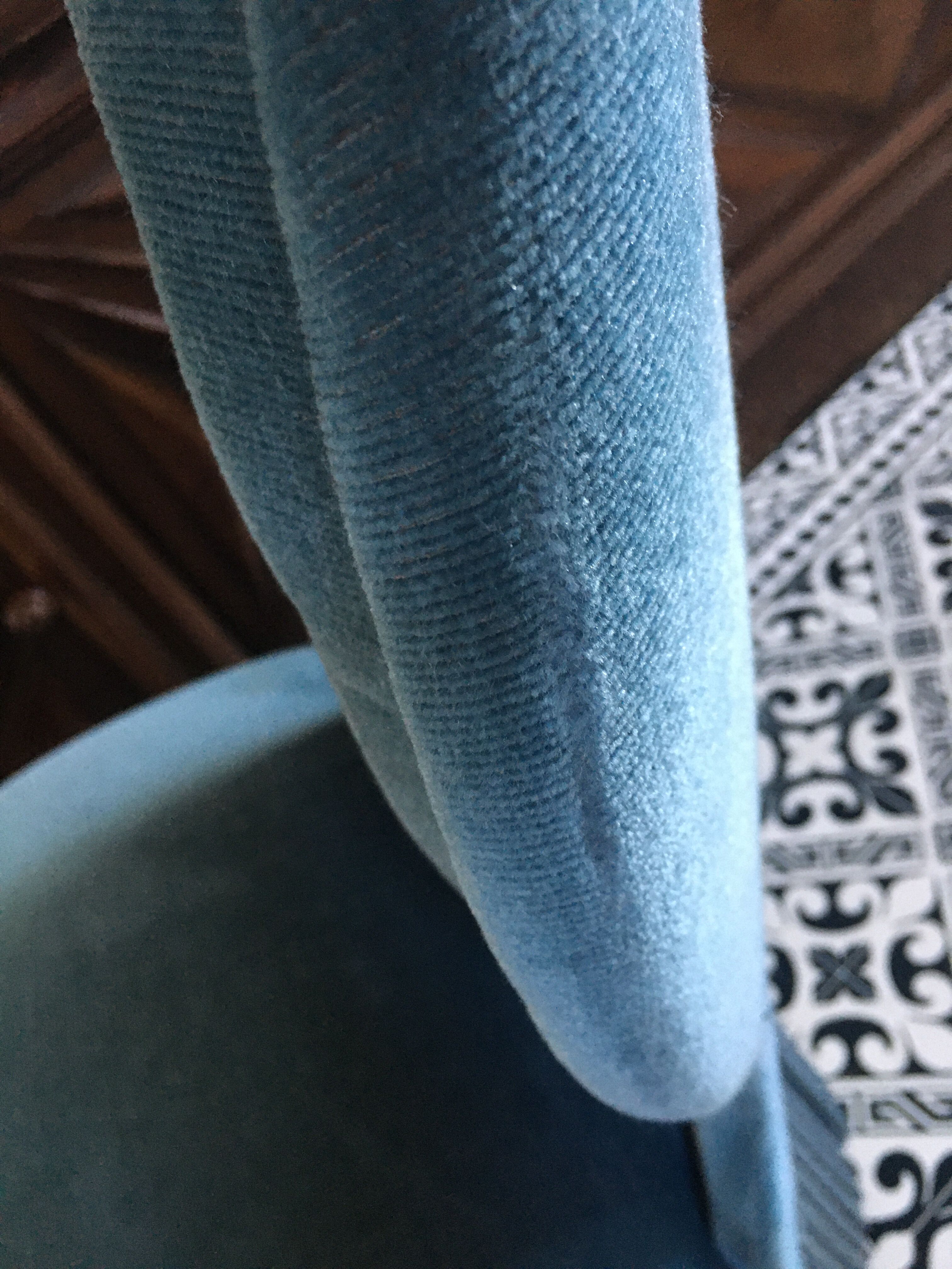Blue heater with fringed medallion shape