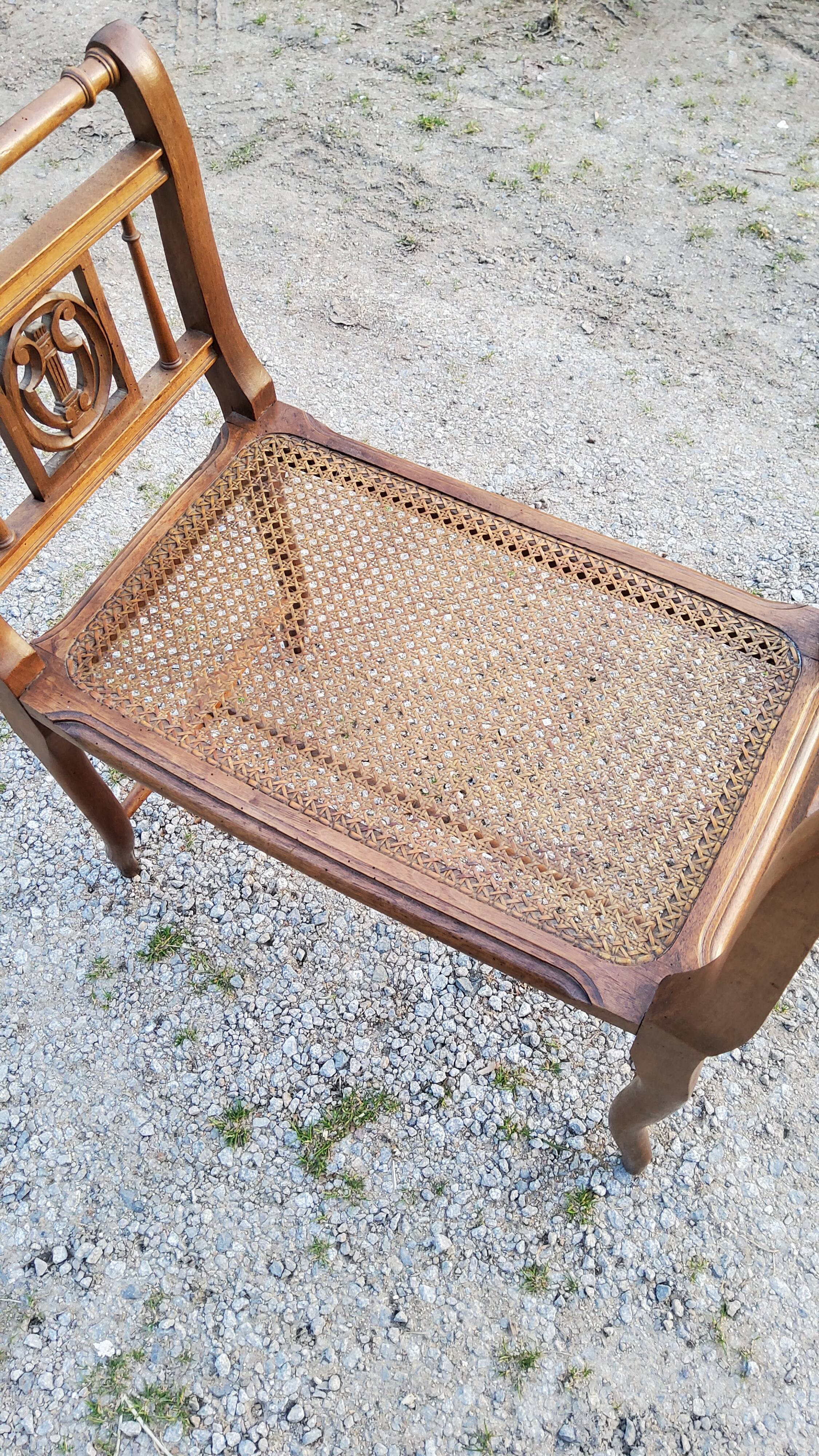 Former walnut cane music bench