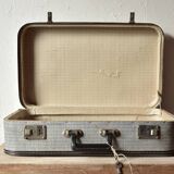 Old cardboard suitcase with its two keys