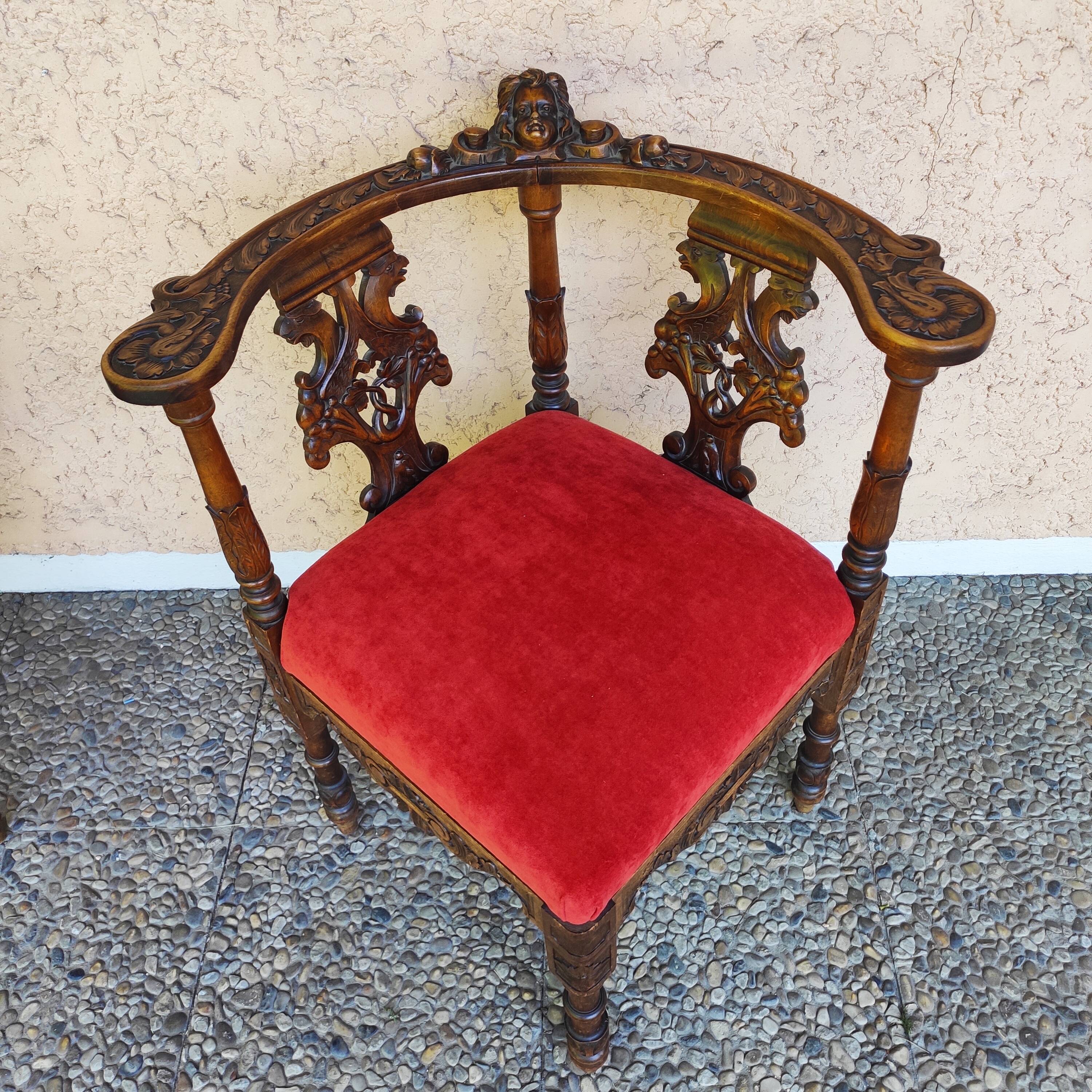 Pair of neo-Renaissance Henri II corner armchairs in carved wood, 19th century.