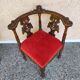 Pair of neo-Renaissance Henri II corner armchairs in carved wood, 19th century.