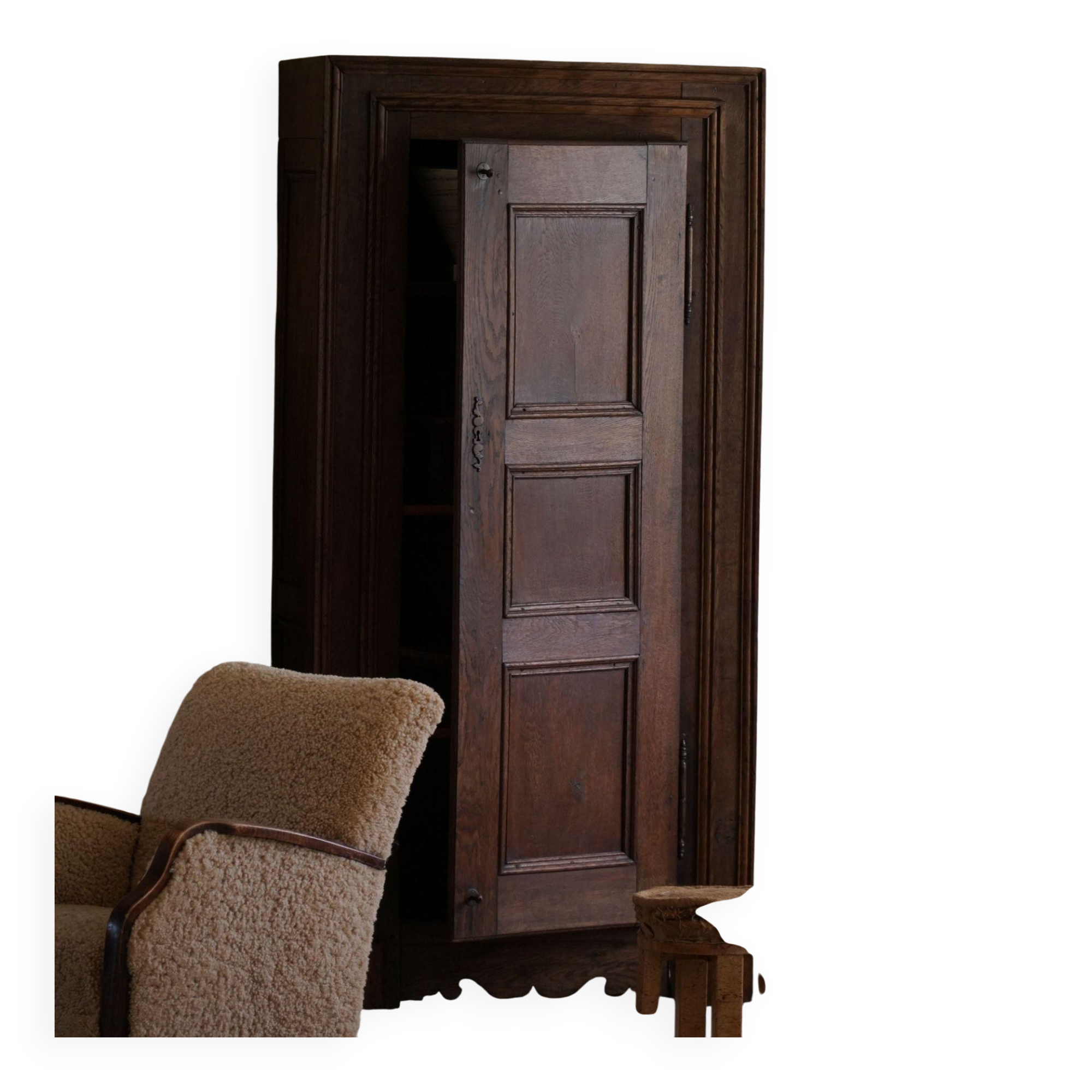 Tall antique oak wardrobe, made by a French cabinetmaker, late 19th century.