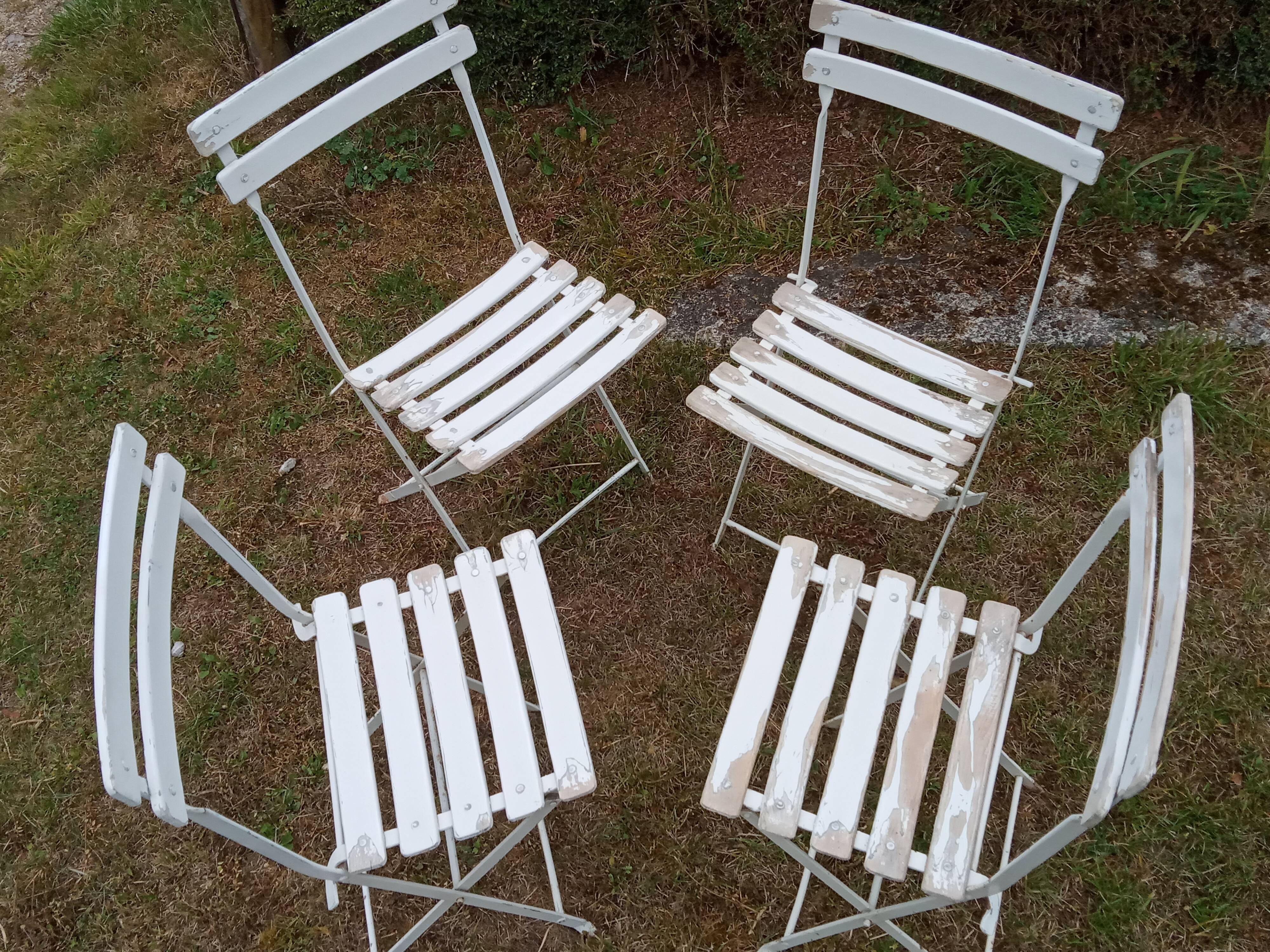 Four old garden chairs