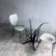Elegant pair of French dining chairs by Jacques Hitier from the 1950s.