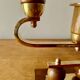 Pair of Art Deco candlesticks in gilded brass and wood