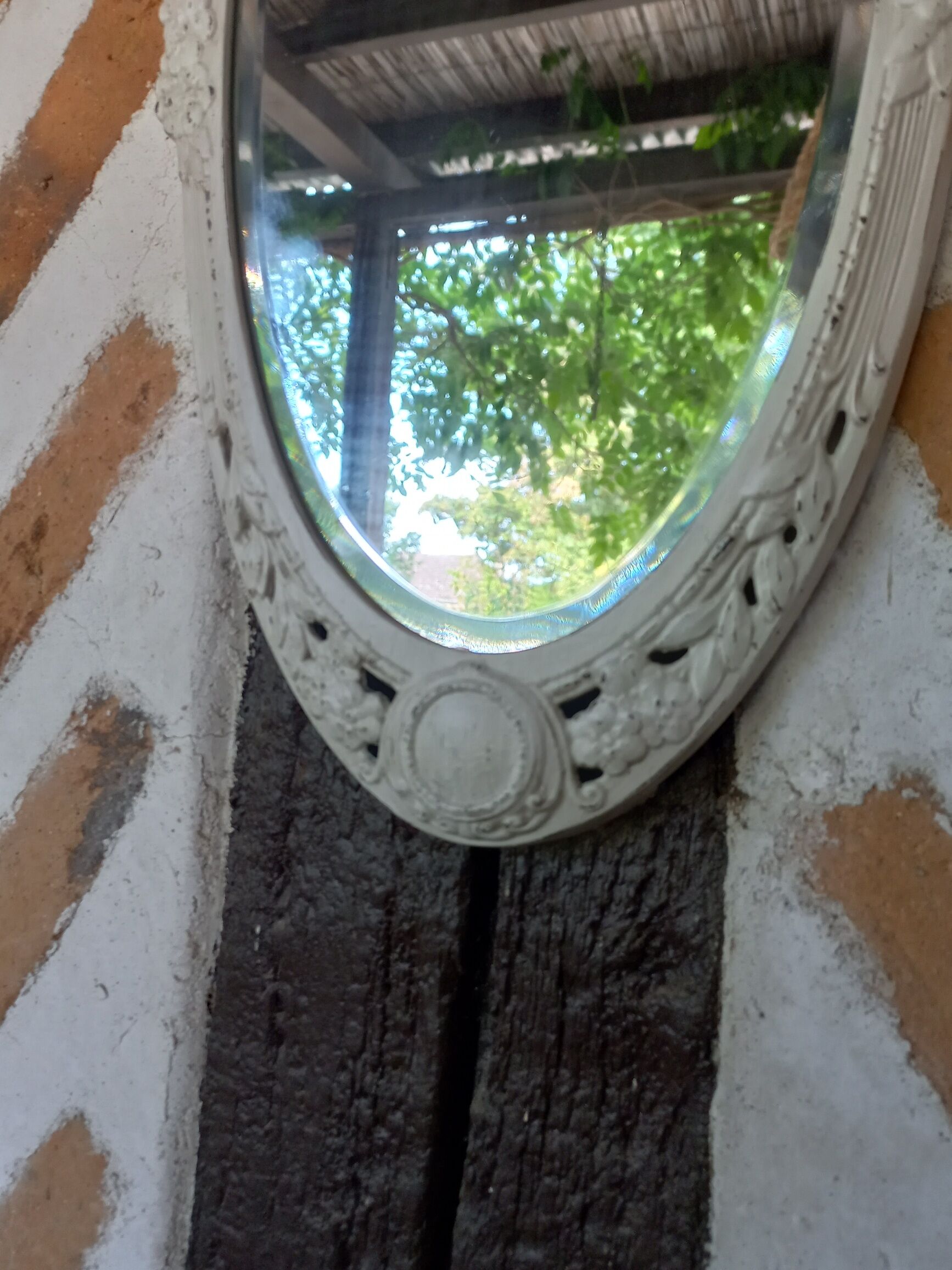 Oval mirror Art Deco patinated linen