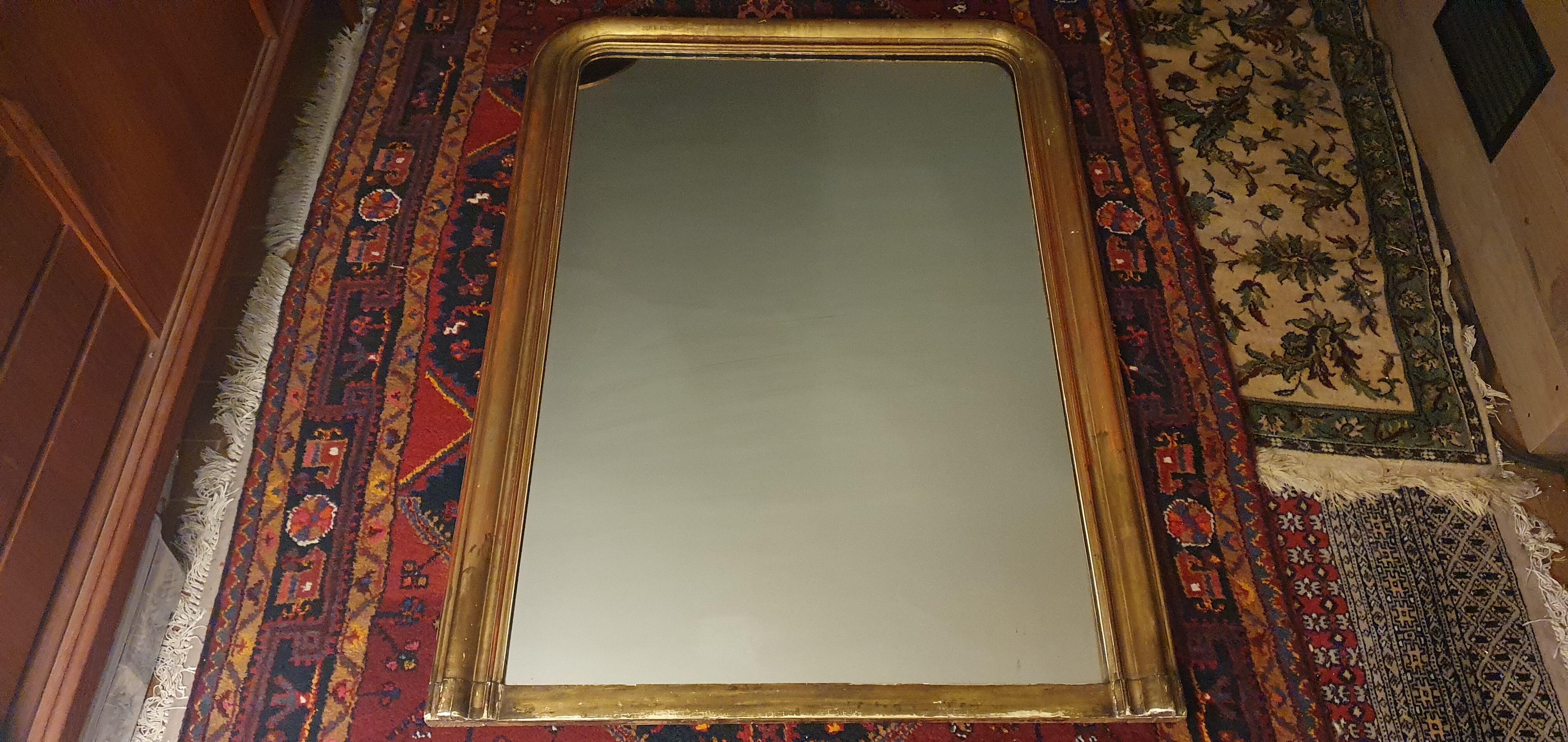 Large Louis Philippe mirror gilded with leaf. 137 x 99 cm.