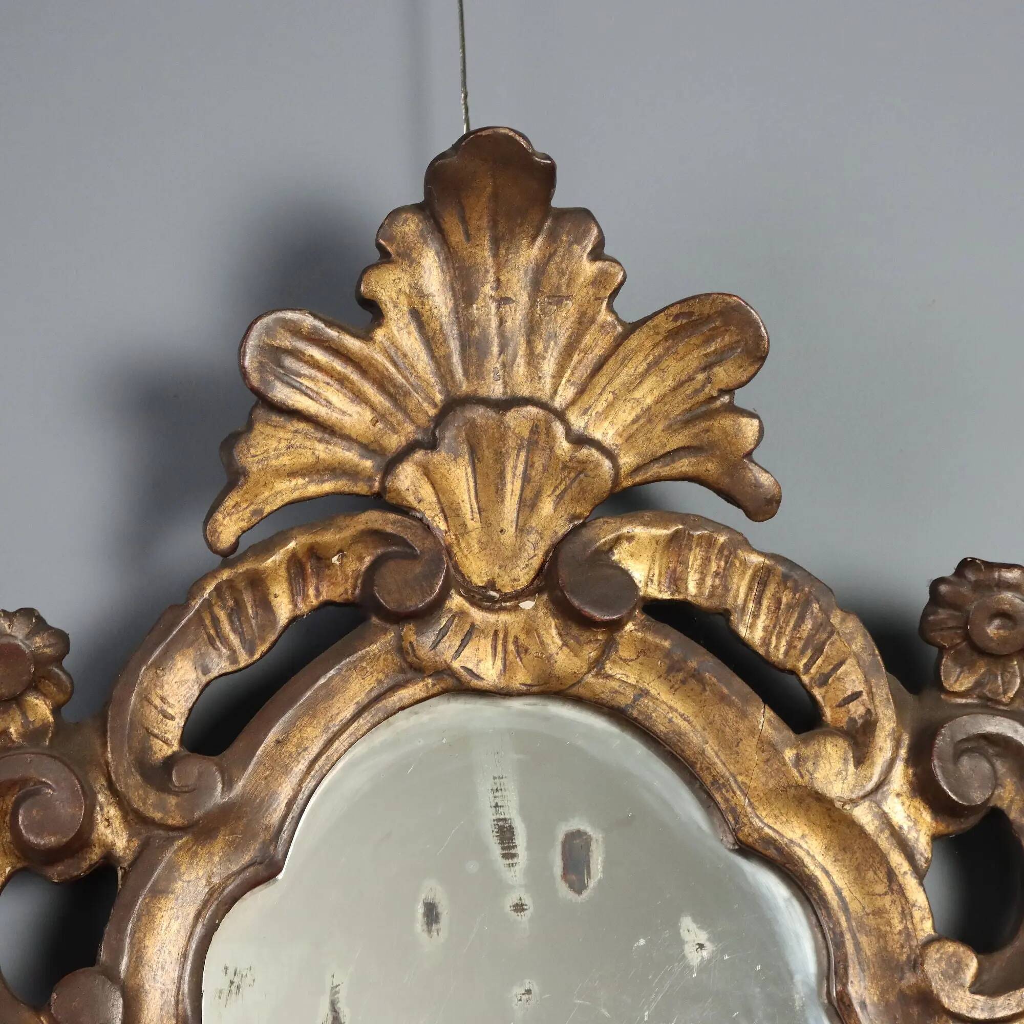 Small antique mirrors in carved and gilded wood, Italy, 20th century.