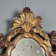 Small antique mirrors in carved and gilded wood, Italy, 20th century.