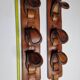 Pair of game bags in saddle leather and brass, old, 3 hooks, 57 cm