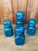 Set of 4 vintage blue glass jars.