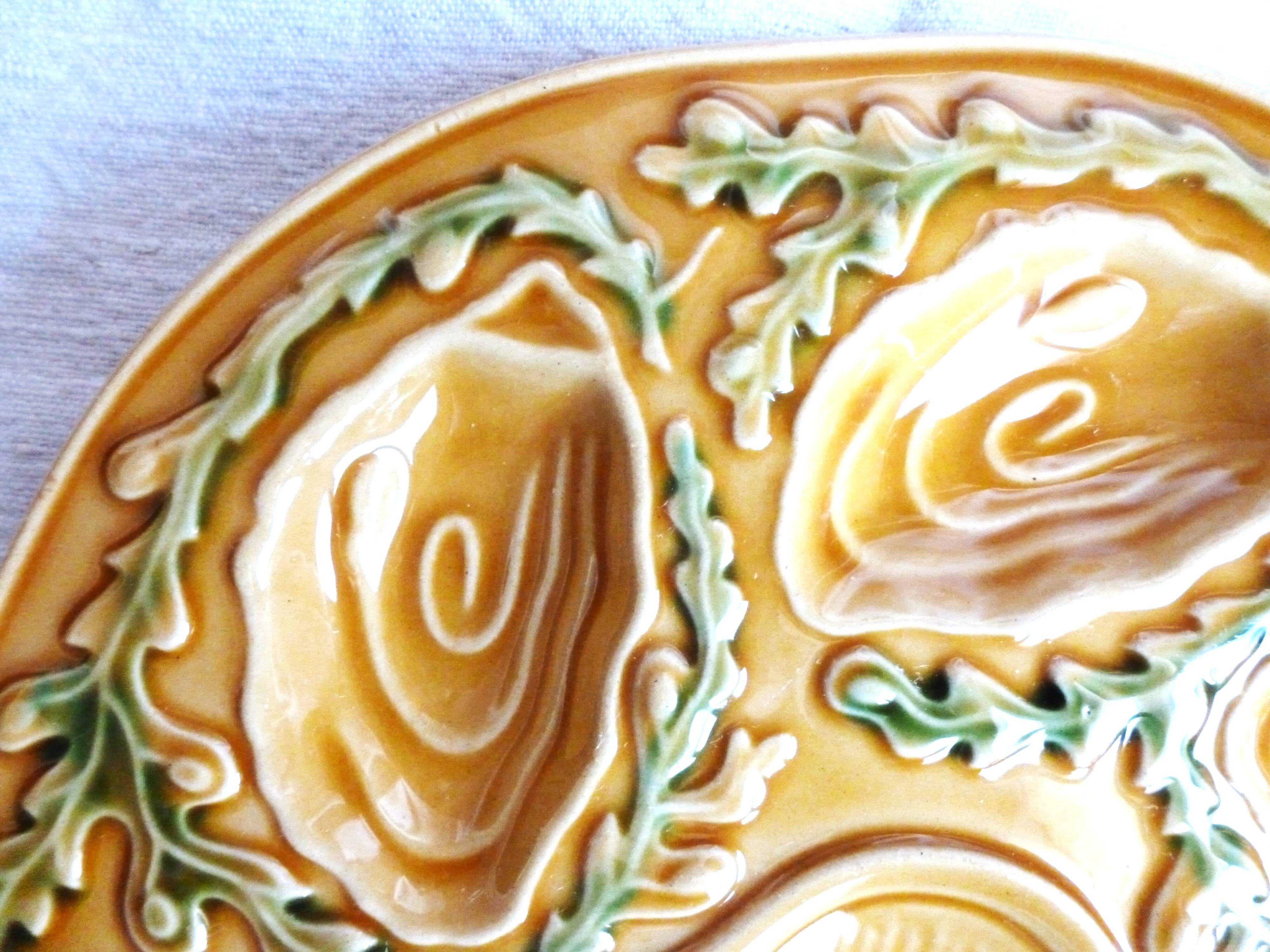 Oyster plates in slip, seafood plates, festive table.