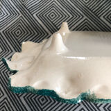 Rectangular dish and knife by Paul Fouillen