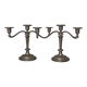 Pair of three-light candlesticks in silver-plated metal