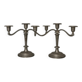 Pair of three-light candlesticks in silver-plated metal