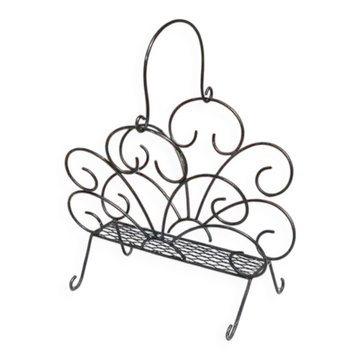 Old wrought iron magazine rack
