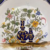 Pair of Nevers earthenware plates signed Georges