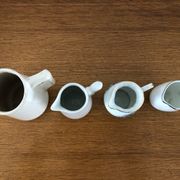 Set of 4 Vintage Porcelain Milk Jugs