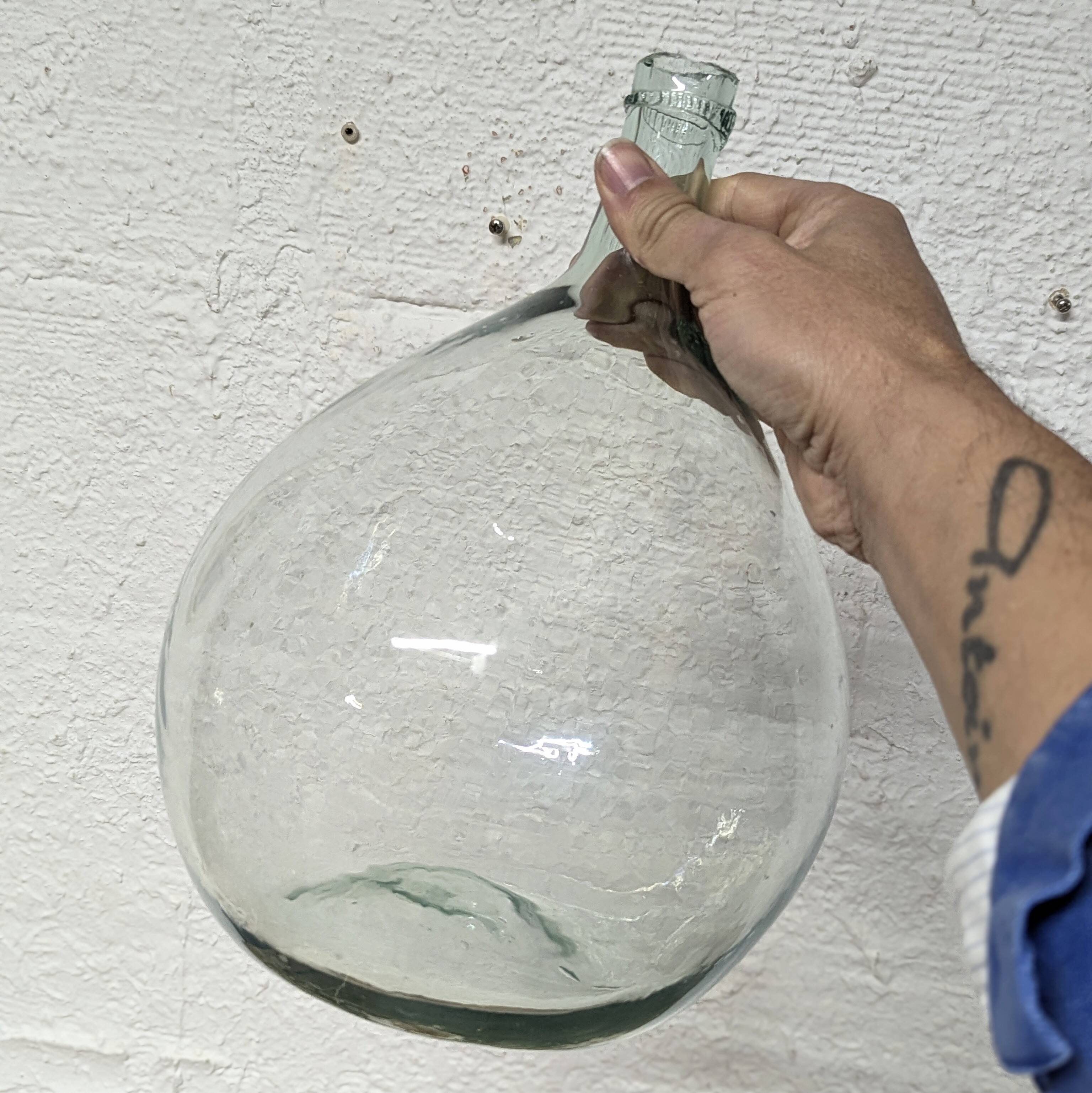 Transparent demijohn in blown glass