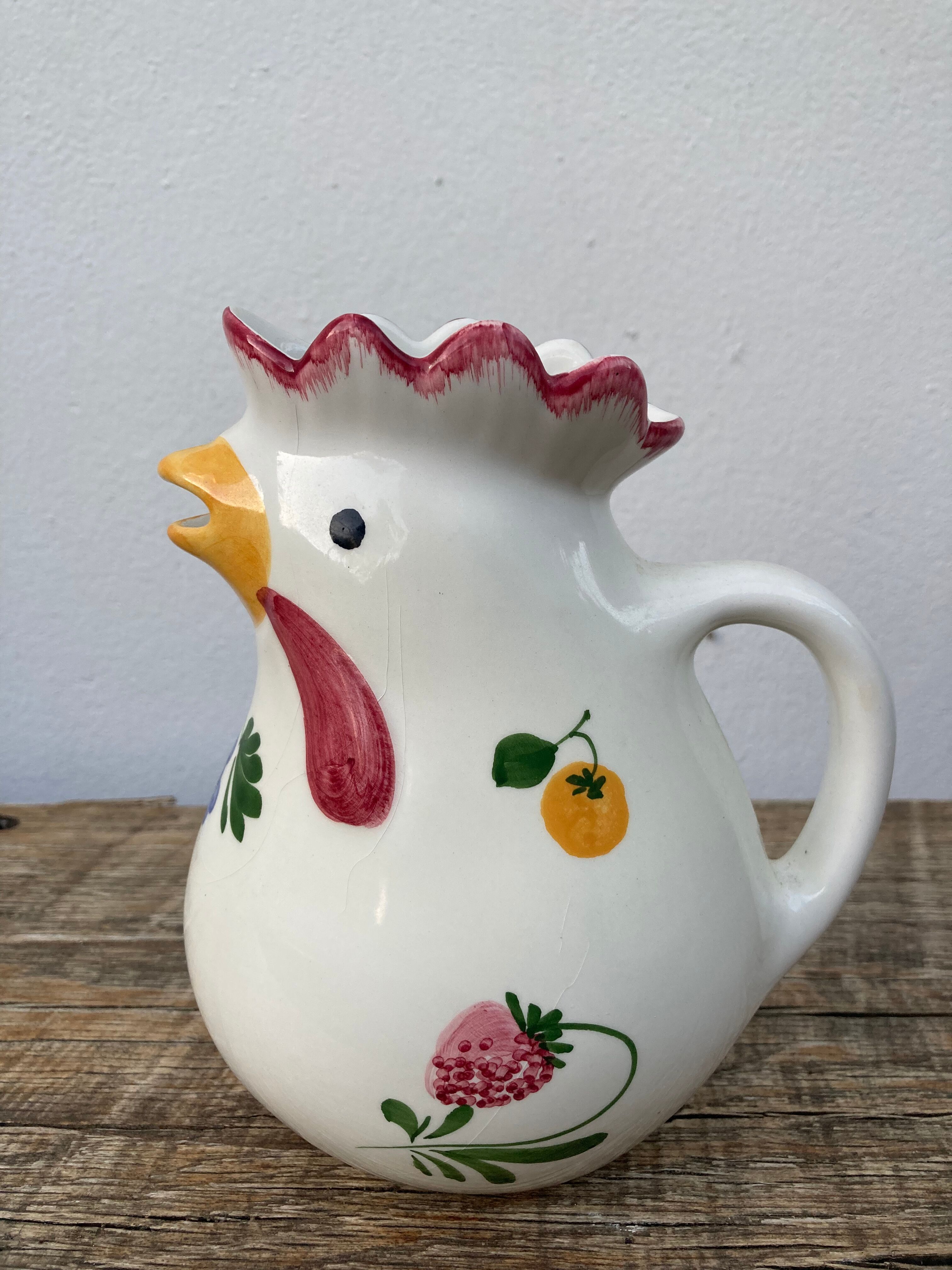 Ceramic rooster pitcher decorated with vintage flowers