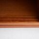 Modern mid-century teak sideboard with brass details.