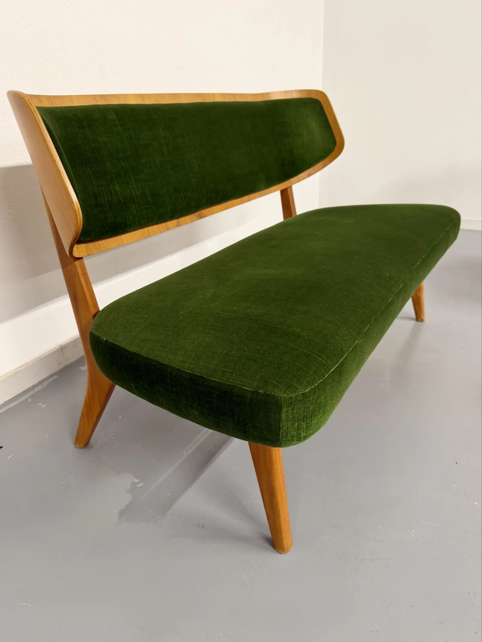 Sofa and armchair designed by Herta-Maria Witzemann, moulded wood, 1960s.