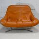 Sofa "space age". Leather, fiberglass, foam, steel. Circa 1970. Orange.