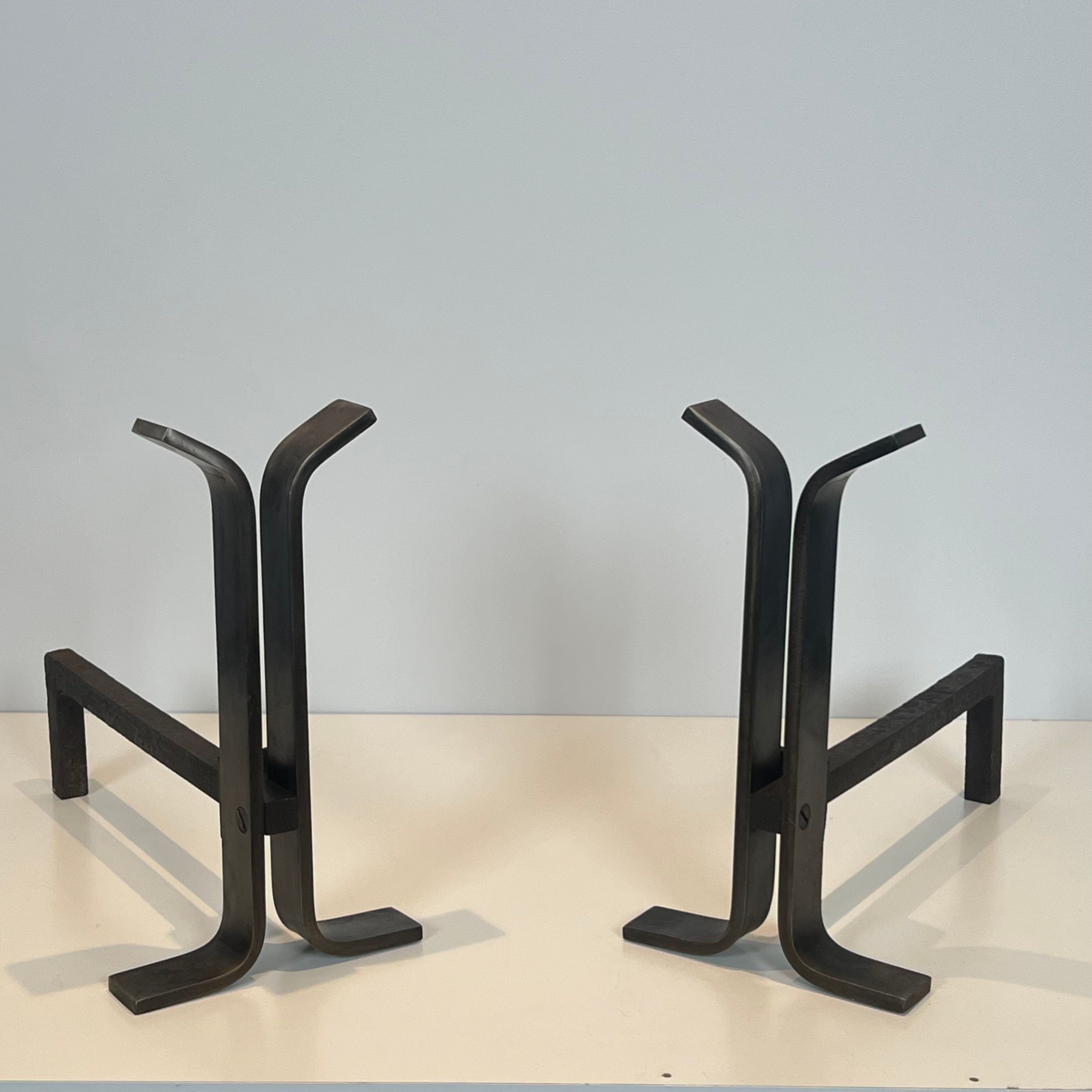 Pair of modernist and wrought iron fire dogs