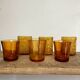 6 mismatched vintage amber glasses
