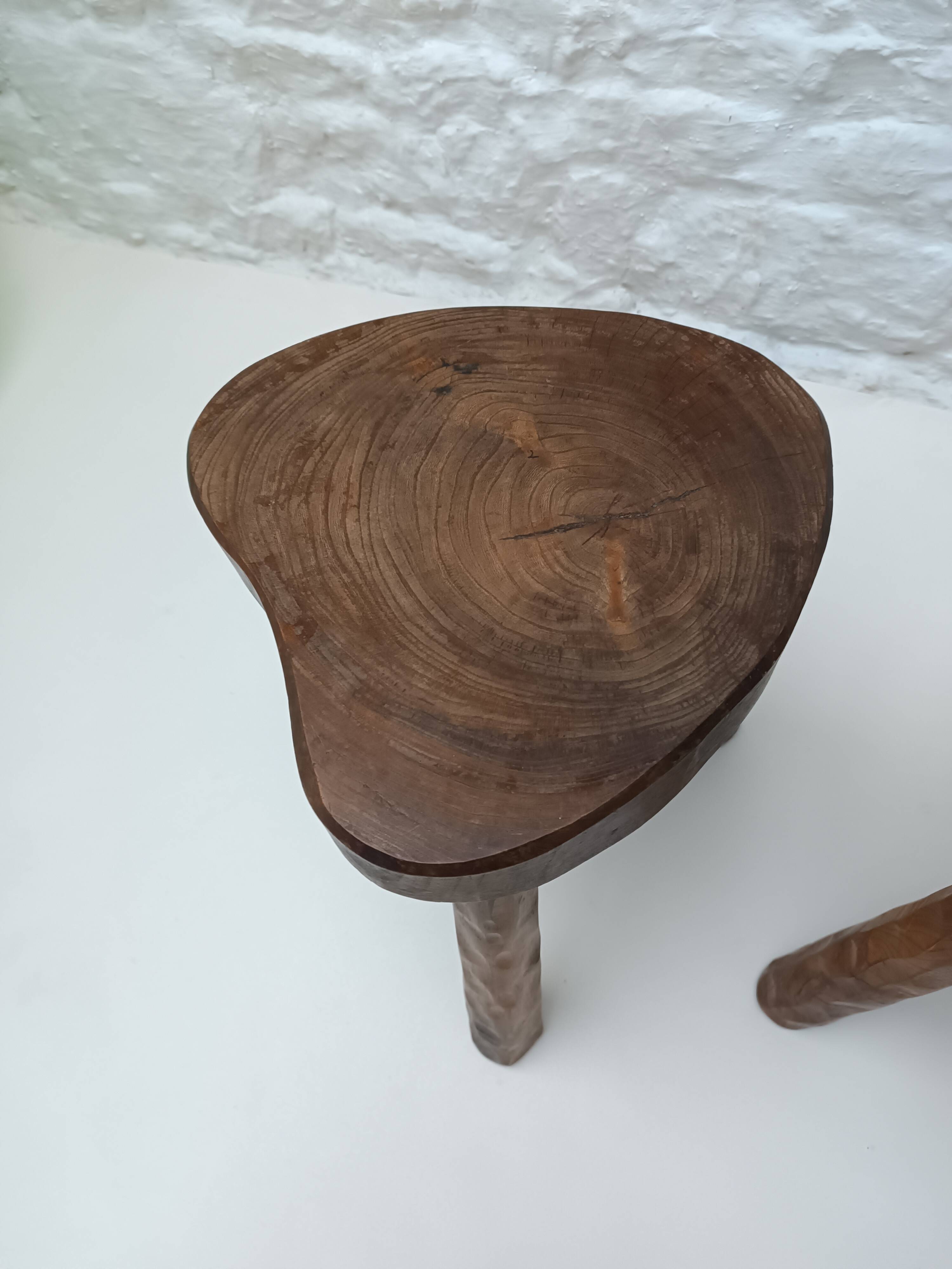 Pair of tripod stools in vintage 50s/60s brutalist elm.