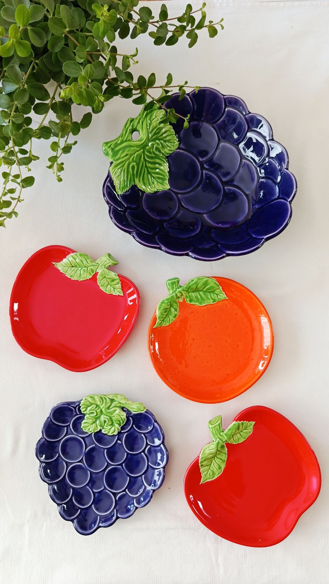 bowls and cups in slipware fruits