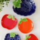 bowls and cups in slipware fruits