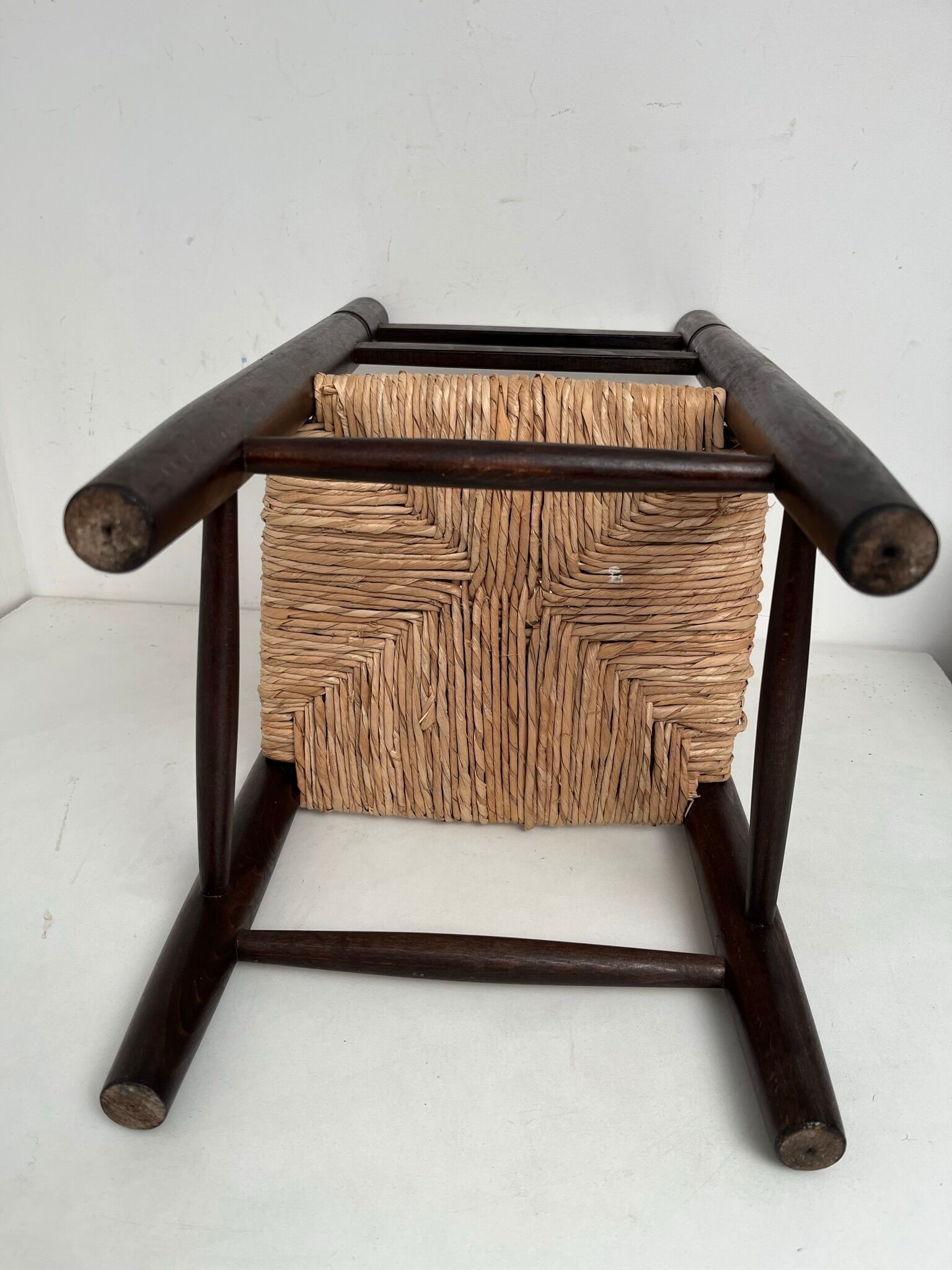 Wooden children's chair with vintage straw seat