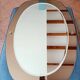 Vintage oval smoked glass mirror