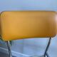 LM vintage chrome and orange/mustard yellow faux leather chairs