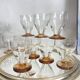 9 Art Deco wine or water glasses with amber stems, 9 cl.