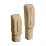 Set of two minimalist stone face statues