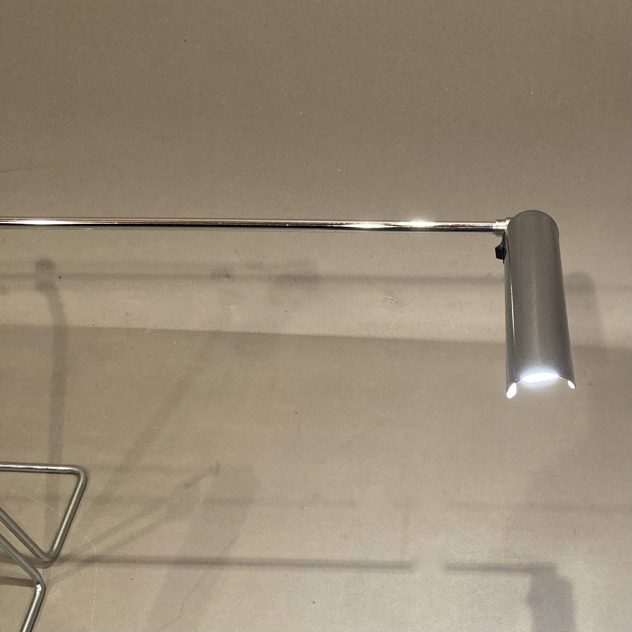 Large modular chrome lamp.