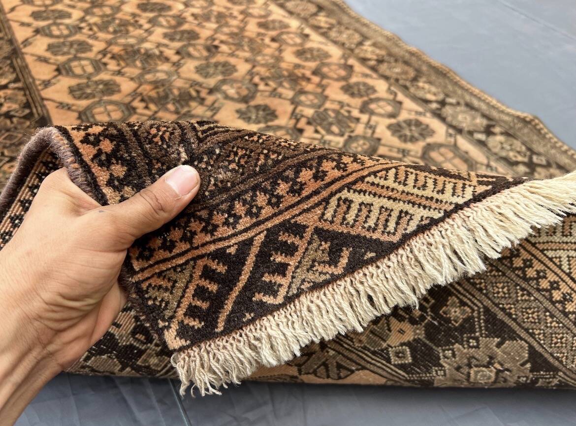 Old faded terracotta rug | Turkmen tribal wool rug