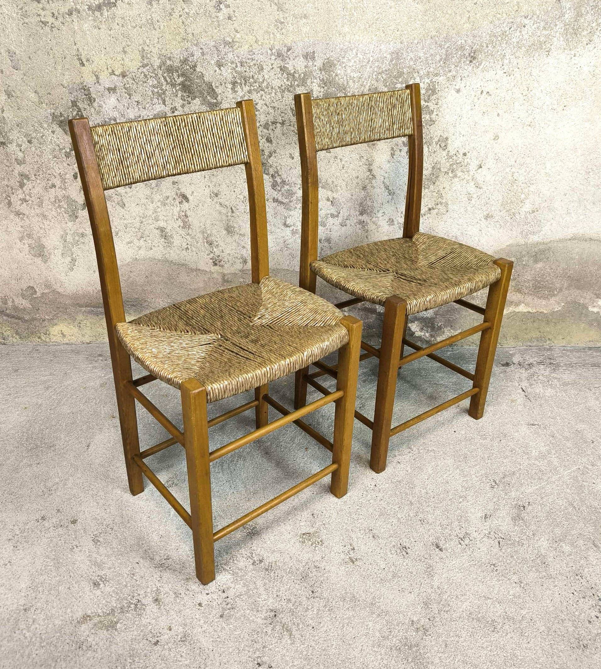 Pair of vintage wood and straw chairs