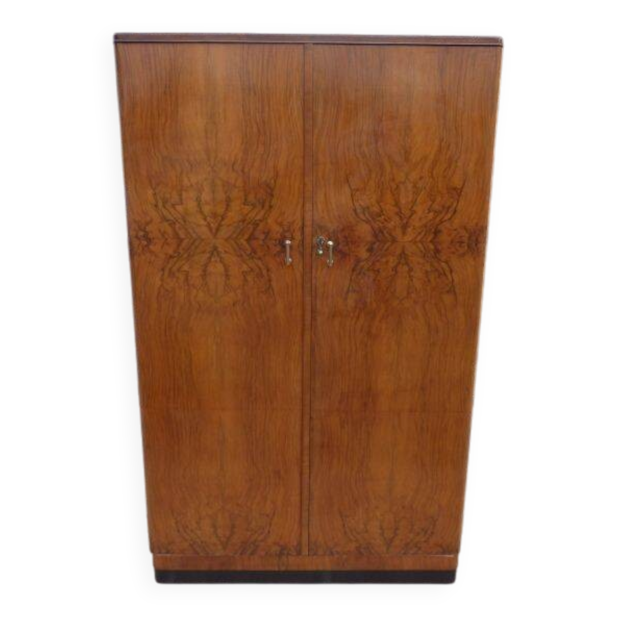 Wardrobe on a plinth in walnut and walnut veneer circa 1940.