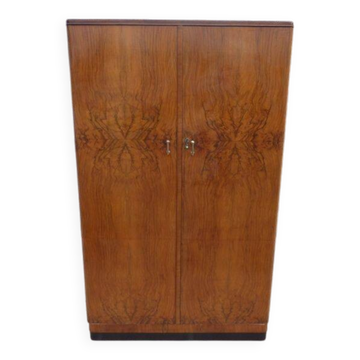 Wardrobe on a plinth in walnut and walnut veneer circa 1940.