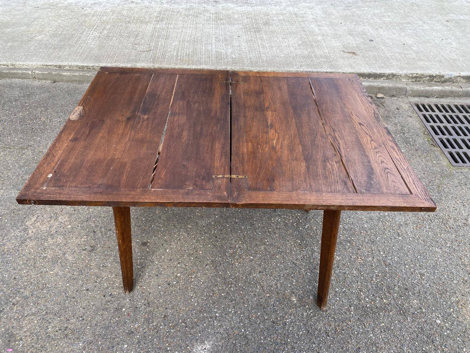 Scandinavian extendable dining table with storage in 19th-century oak.