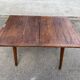 Scandinavian extendable dining table with storage in 19th-century oak.