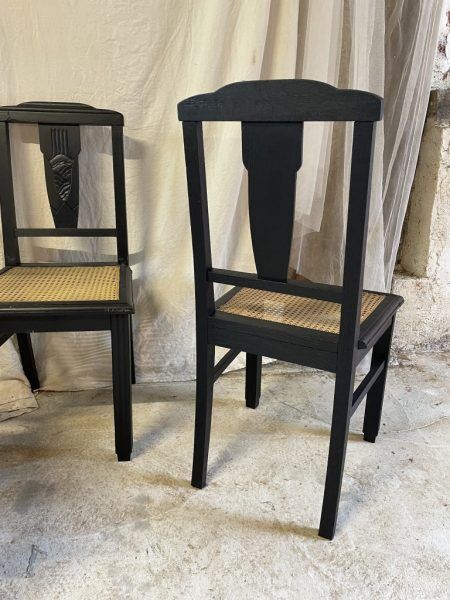 Black chairs and cannage