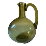 Green blown glass carafe